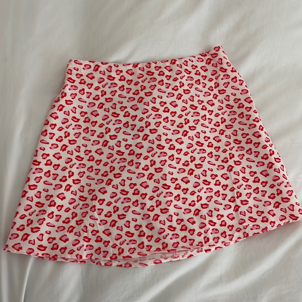 Brand new cheetah print Princess Polly silk skirt size 4.